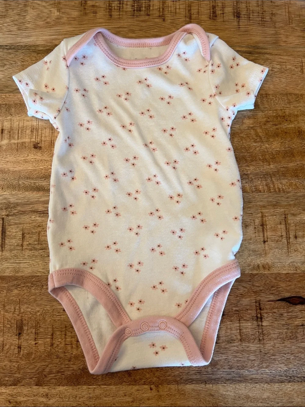 Carter's Baby One-Piece Bodysuits in White, Pink, and Sage Green